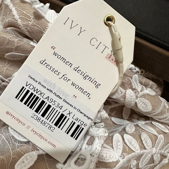 Ivy City Co White Midi Dress with Elegant Design - Picture 12 of 12